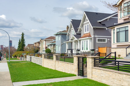 Street of luxury residential houses on cloudy day in Vancouver, Canada.の写真素材