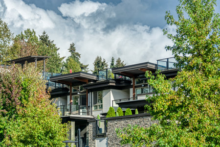 Top of residential building on hovering clouds backgroundの写真素材