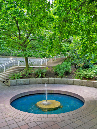 Small inner yard of residential area with fountain in downtown of Vancouverの写真素材