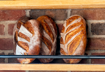 Baked loafs at the show shelf of a bakery