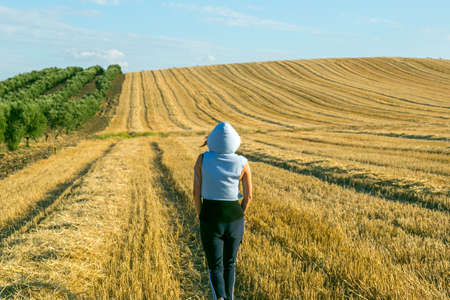 woman walking around the countryside in sportswear