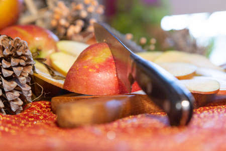 Composition with red apples with knife cutの写真素材
