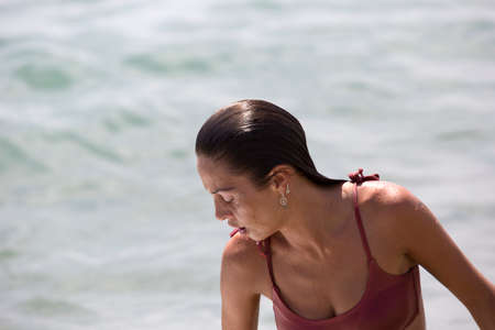 girl in red bikini on the beachの写真素材