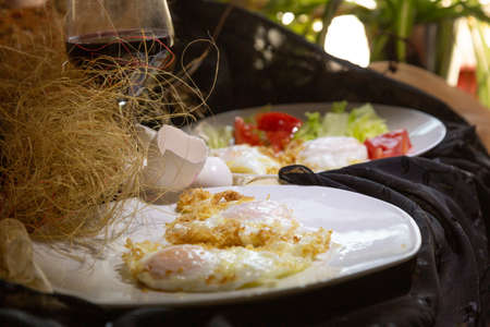 Traditional cuisine, plate of homemade fried eggsの写真素材