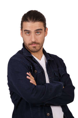 young man with long hair and black sweater on white background gesturing-の写真素材