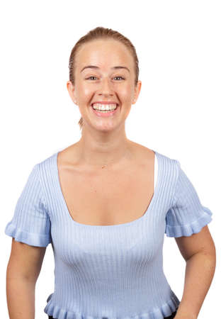 Attractive blonde young woman smiling on white backgroundの写真素材