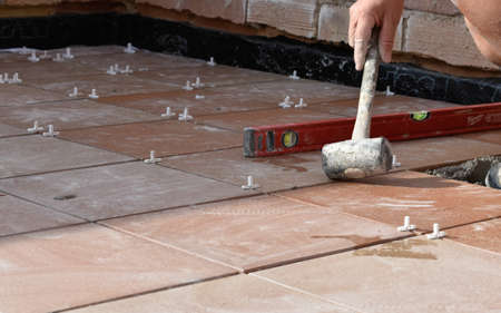 Hands of man working in masonry, unrecognisableの写真素材