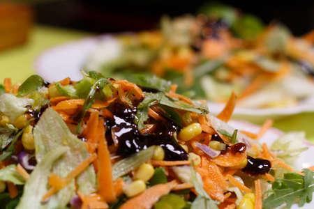 Close-up of a plate with a fresh mixed salad of the dayの写真素材