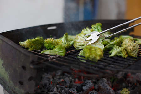 broccoli grilled on homemade barbecue, healthy vegetarian foodの写真素材