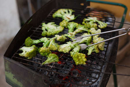 broccoli grilled on homemade barbecue, healthy vegetarian foodの写真素材