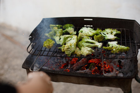 broccoli grilled on homemade barbecue, healthy vegetarian foodの写真素材