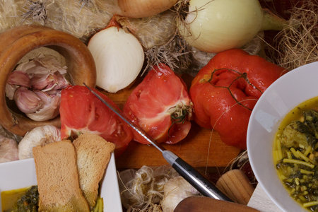 Make a tasty Mediterranean soup with fresh, aromatic ingredients for a wholesome mealの写真素材