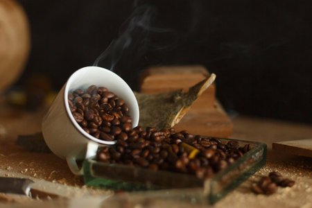 Spilled Coffee Beans with Steam Rising in a Cozy, Inviting Setting Perfect for Relaxationの写真素材