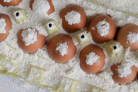 A delightful bunch of eggs is artfully covered in a generous layer of powdered sugar, adding...