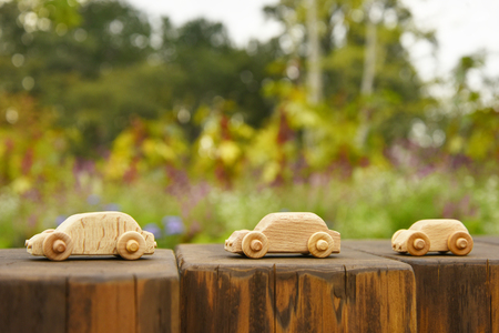 Miniature wooden carsの写真素材