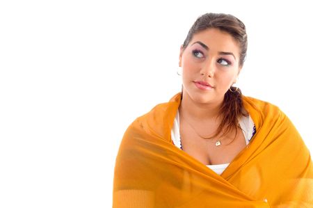 beautiful woman posing in yellow with white backgroundの写真素材