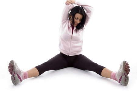 front view of woman doing exercise on an isolated white backgroundの写真素材