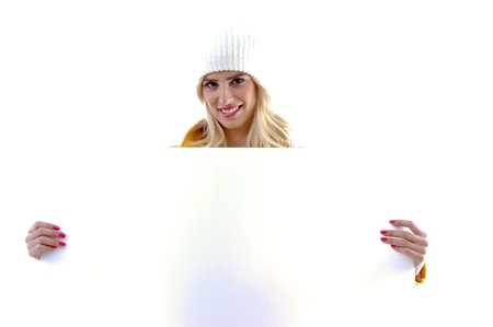 portrait of female carrying placard with white backgroundの写真素材