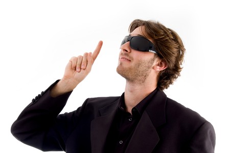 portrait of man pointing upward with white backgroundの写真素材