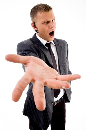 young guy expressing frustration against white background