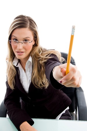 businesswoman showing pencil on an isolated white backgroundの写真素材