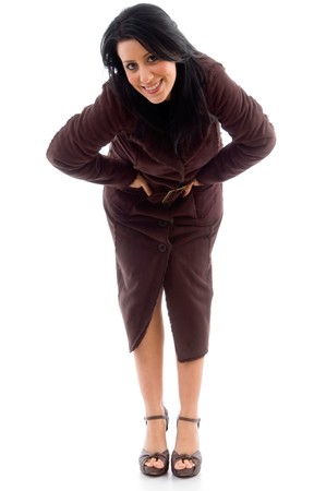 front view of bending woman wearing overcoat on an isolated backgroundの写真素材