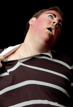Clown posing against black backgroundの写真素材
