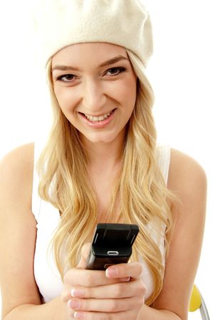 portrait of smiling model holding mobile with white backgroundの写真素材
