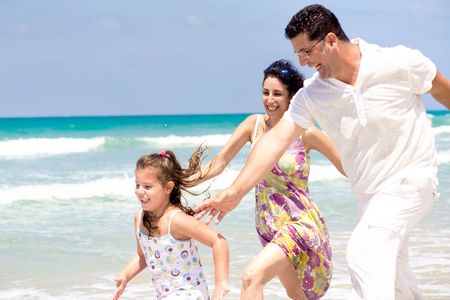 Family day at the beachの写真素材