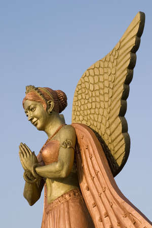 Low angle view of the statue of an angelの写真素材