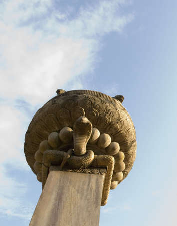 Low angle view of an idol on a pillar, Katmandu, Nepalの写真素材