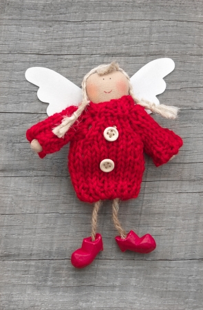Top view of flying angel decoration on cardboardの写真素材