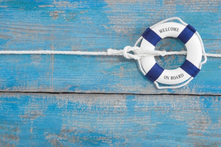 Blue wooden background with  welcome on board  for maritme decoration or teamworの写真素材