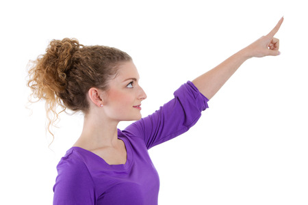  Young woman in violet points on somethingの写真素材