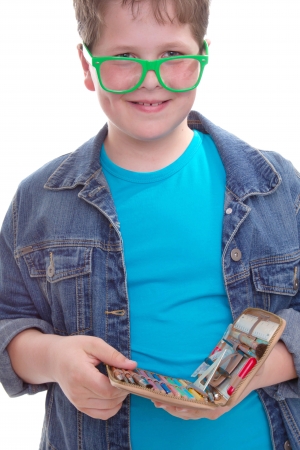 Isolated funny schoolboy in green glasses の写真素材