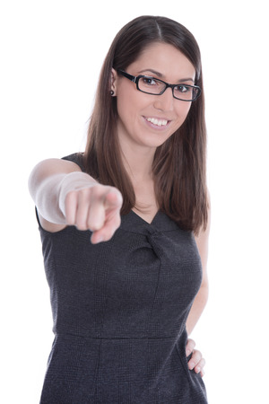 Attractive caucasian young woman with glasses and pointing at you - isolated on white.の写真素材