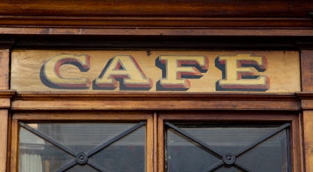 Old wooden sign in Paris for a coffee houseの写真素材