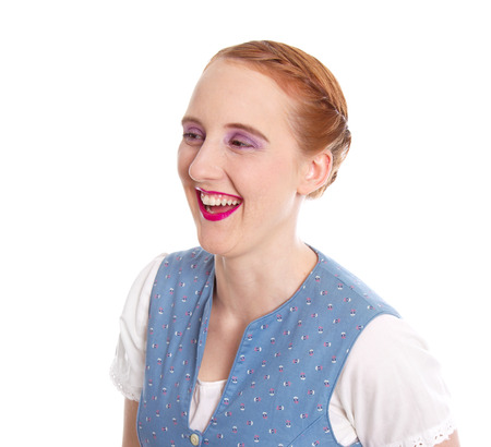 Isolated laughing girl in dirndl の写真素材