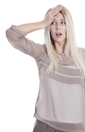 Attractive frustrated woman with hand up isolated on white.の写真素材