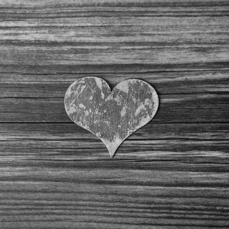 Grey wooden heart on shabby chicの写真素材