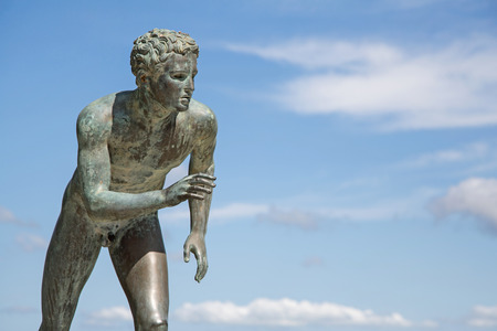 A statue of 'The Runner' or fist fighter in the garden of Achilleion in Corfu.の写真素材