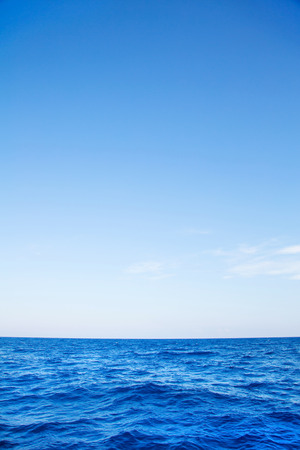 Blue ocean background with horizon on the blue sea.の写真素材