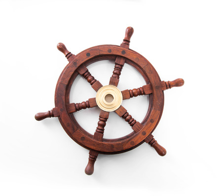 Old boat steering wheel isolated on the white background.の写真素材