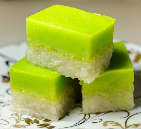Seri Muka  also Kuih Seri Muka or Sri Muka  Malay  Pretty face  or Kuih Salat   is a two-layered dessert with steamed glutinous rice forming the bottom half and a green custard layer の写真素材