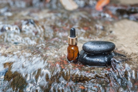Essence oil and zen stone in spa concept
