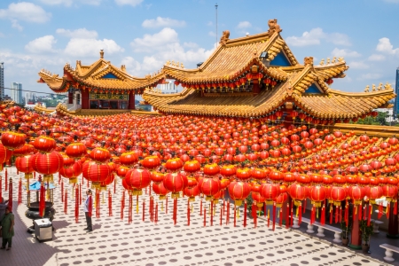 An unknown man praying under thousands of red lanterns at Thean Hou Temple, Kuala Lumpurのeditorial素材