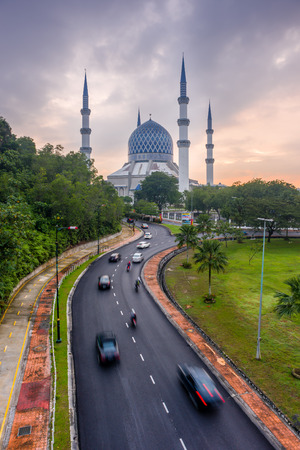 The beautiful Sultan Salahuddin Abdul Aziz Shah Mosque at Sunrise. Also known as the Blue Mosque located at Shah Alam, Selangor, Malaysiaのeditorial素材