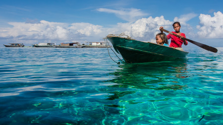 Sea Gypsy Kids on their Sampan.のeditorial素材