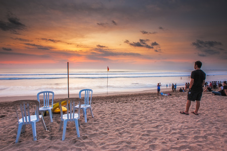 Tourist viewing sunset at Kuta Beach, Bali.のeditorial素材
