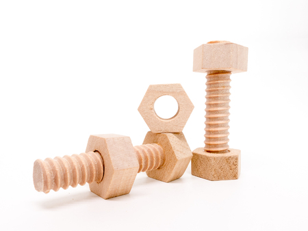 Isolated - Wooden bolt and nut on white background.の写真素材